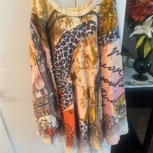 A line shirt with sequins and Mexico inspired print